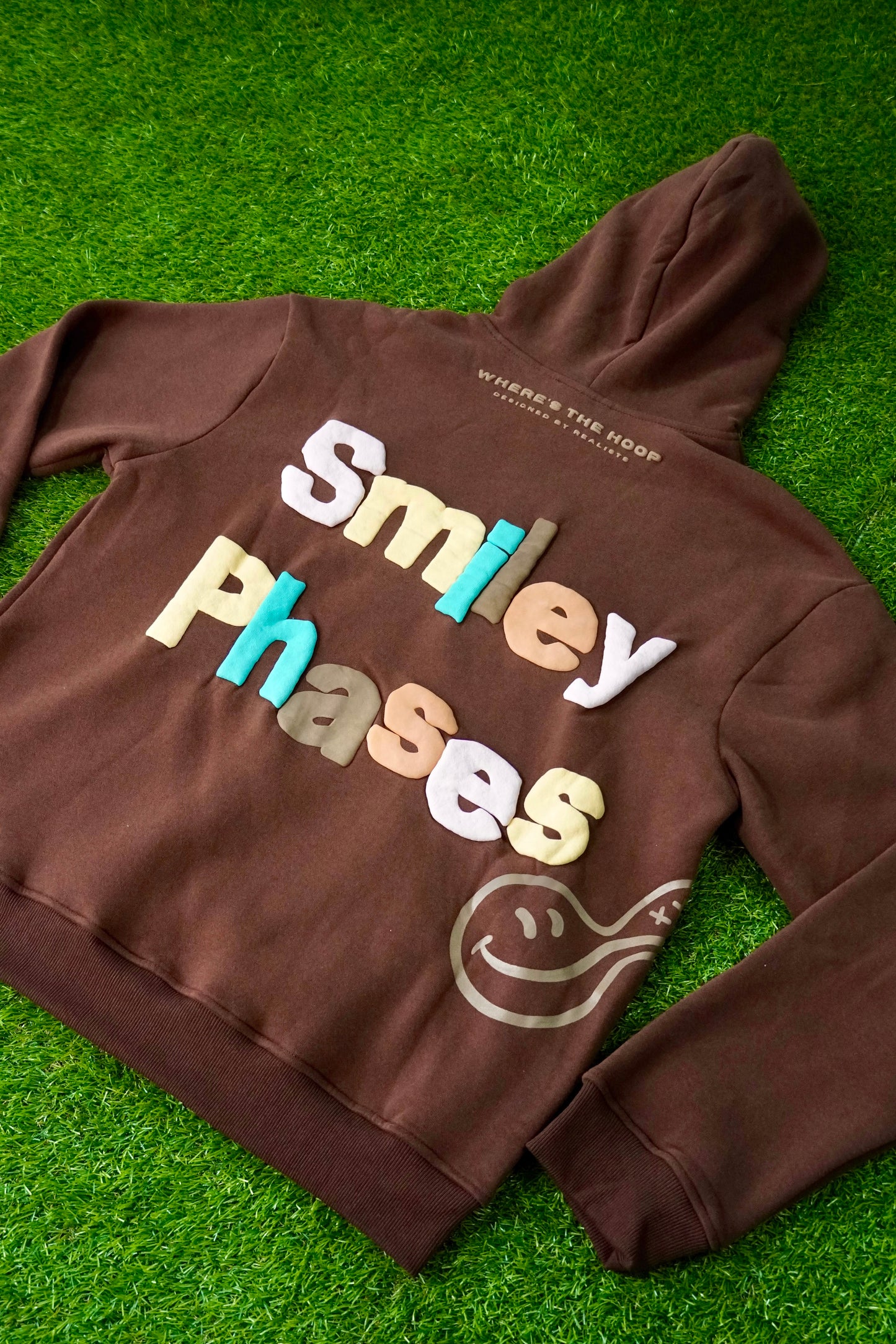 "Smiley Phases" Hoodie - Cosmic Brownie